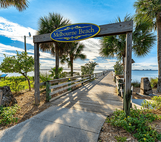 the Melbourne Beach Pier, a historic wooden pier located in Melbourne Beach, Florida that extends over the Indian River Lagoon